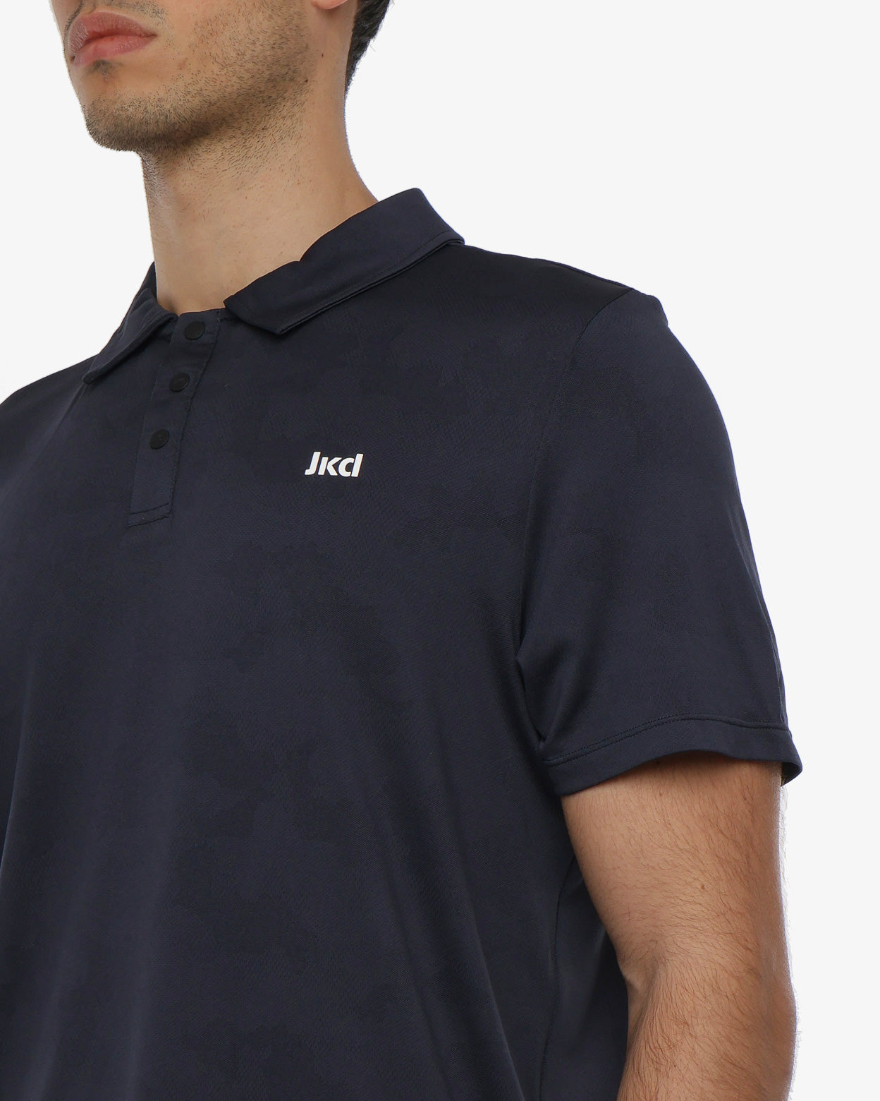 polo-jaked-commuter-con-bottoni-in-materiale-tecnico-traspirante-per-sport-e-tem image 4